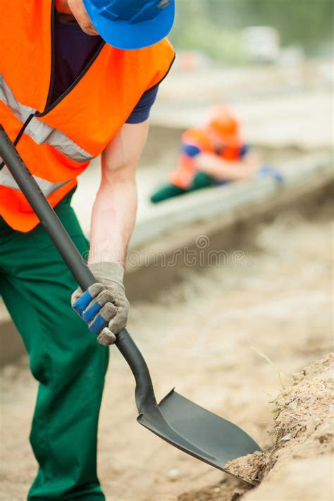 515 Construction Worker Holding Shovel Stock Photos Free And Royalty