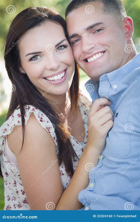 Gorgeous Mixed Race Romantic Couple Portrait Outdoors Stock Photo