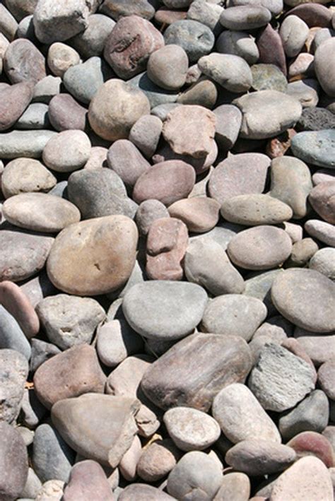 Some Rocks Are Laying On The Ground And There Is No Image Here To