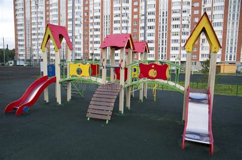 Children`s Set Of Wooden Slides On The Playground Of The City Stock