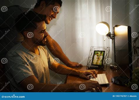 Lgbt Married Caucasian Gay Couple Working At Home Together Stock Image
