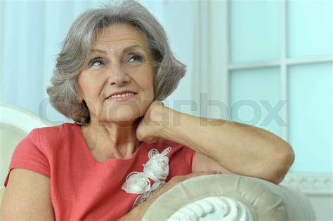 Mature Woman Sitting Stock Image Colourbox