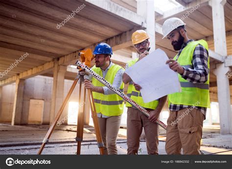 Portrait Of Construction Engineers Working — Stock Photo © Nd3000