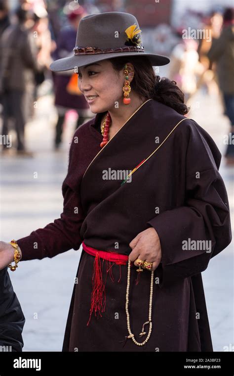 A Khamba Tibetan Woman From The Kham Region Of Eastern Tibet On A