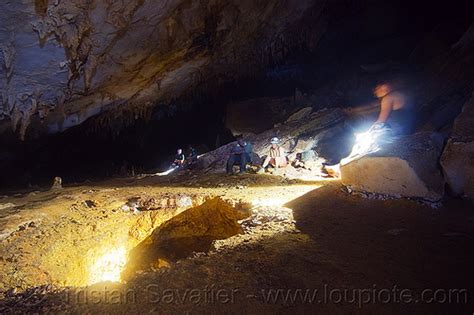 Cavers Scrambling Around Big Blocks Clearwater Cave Mulu Borneo