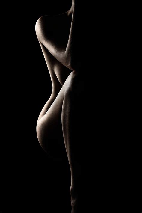 Artistic Nude Fine Art Of A Naked Woman Silhouette On Black Background