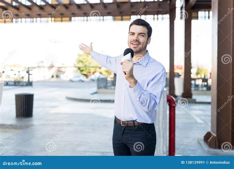 Male Tv Journalist Reporting Outdoors Stock Image Image Of Campus