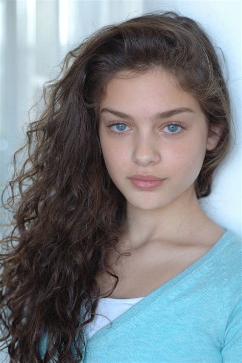 Download Amazing Charisma Blue Eyed Girl With Voluminous Curly Hair