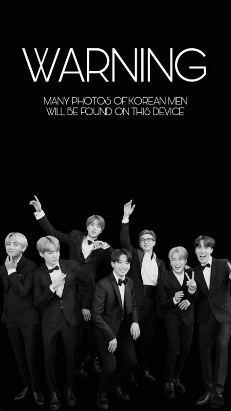 Download Bts Members Showing Off Their Playful Sides Wallpaper