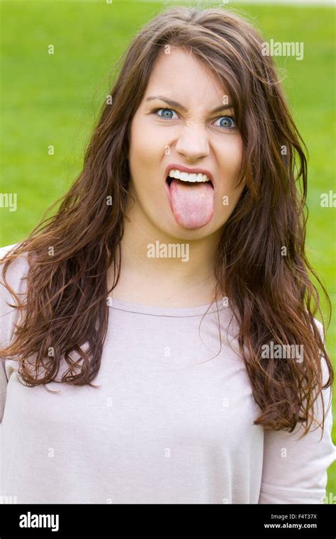 Girl Sticking Tongue Out Stock Photo Royalty Free Image 89039886 Alamy