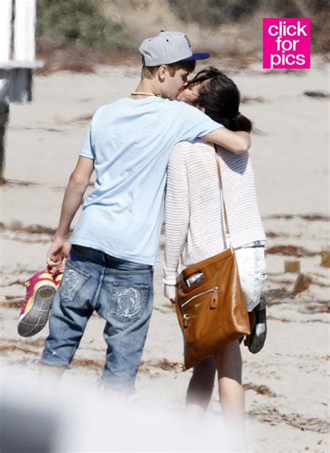New Pics Justin Bieber And Selena Gomezs Major Pda On Beach Kissing
