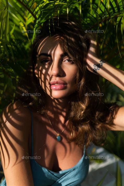 Portrait Of Young Beautiful Girl Tanned Outdoor Natural Sunset Light