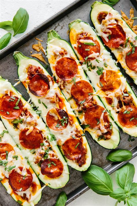 In a small mixing bowl stir together the mozzarella cheese, remaining 1/3 cup parmesan and remaining 1/3 cup panko bread crumbs. Pizza Stuffed Zucchini Boats | Downshiftology