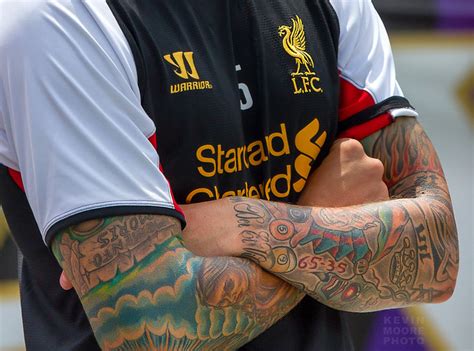 In addition to playing his own ball agger is known as a tattoo artist. Daniel Agger - Liverpool F.C. | Flickr - Photo Sharing!