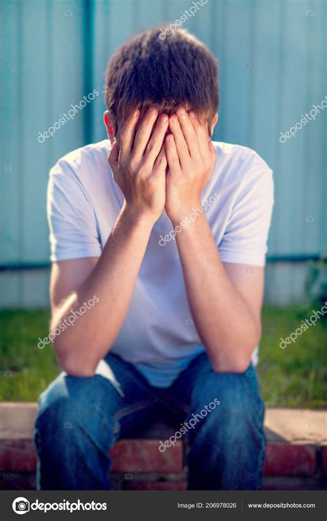 Toned Photo Sad Young Man Portrait Outdoor Stock Photo By ©sabphoto
