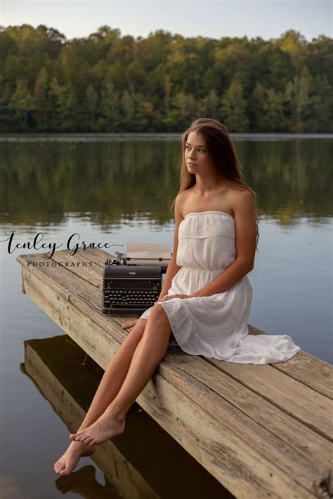 Senior Photo Shoot At Lake On Dock With Vintage Typewriter Senior