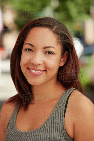 Portrait Of Smiling Black Woman Stock Photo Dissolve