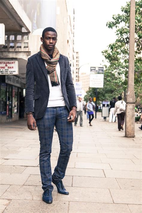 street style from nairobi blue plaid pant white shirt blue velvet jacket with khaki plaid