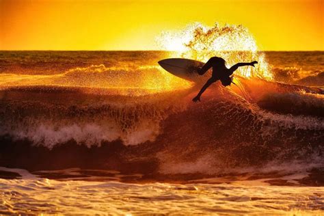 Surfing Waves Sunset Wallpaper And Background Surfing Photos Sunset Surf Surfing Pictures