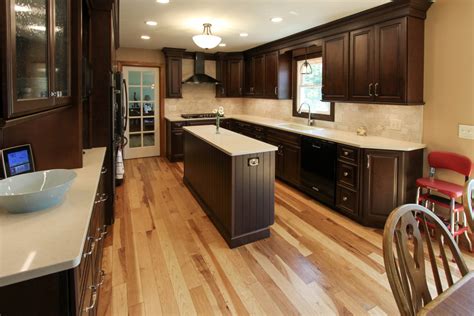 Choosing appliance and cabinet colors for your kitchen can sometimes feel like an overwhelming task with so many options available. Fieldstone Cherry Kitchen with Caesarstone Quartz ...