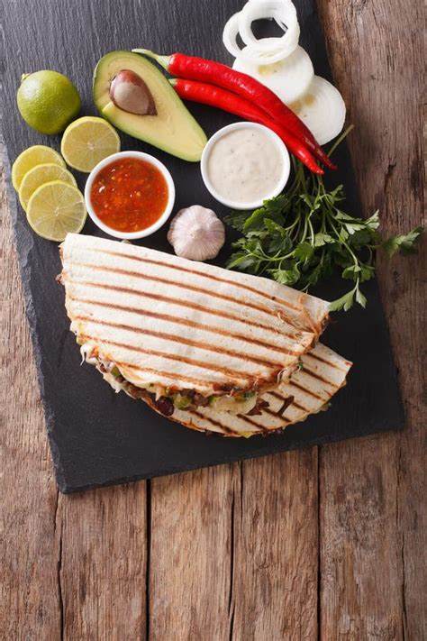 Mexican Quesadilla With Beef Beans Avocado And Cheese Close Up