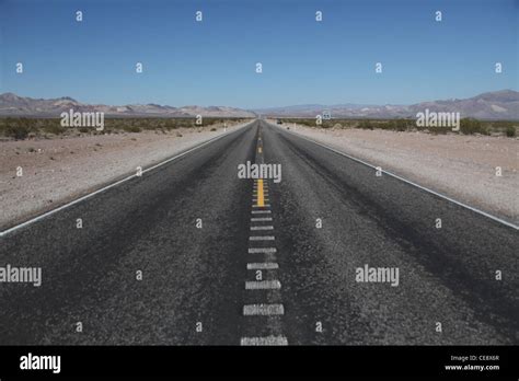 A Road Across The Nevada Desert Stock Photo Alamy
