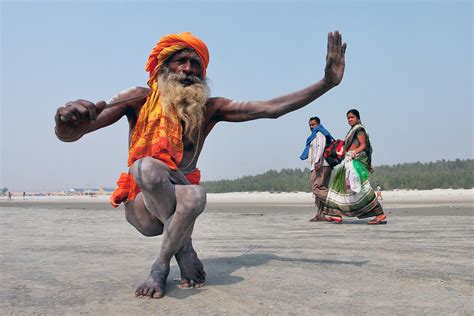 Brett Cole Photography An Elerly Sadhu Holy Man Does Yoga At The