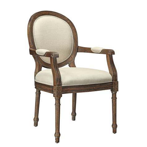 Look for coastal accent chairs with distressed wood legs or rattan and wicker accents. Coastal Accents Accent Chair | Rotmans | Dining Arm Chairs