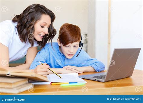 Mom Helps Her Son With Online Homework Stock Image Image Of Support