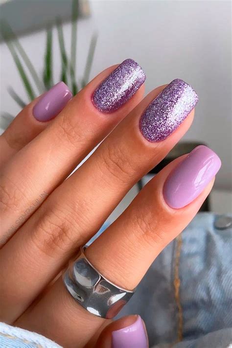 gorgeous light purple nails with glitter design in 2021 purple glitter nails lilac nails