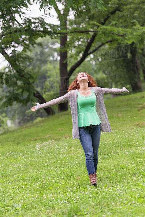 Woman Relaxing In Park Stock Photo Dissolve