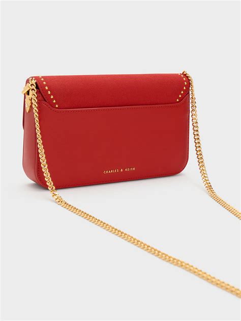Red Merial Metallic Accent Studded Clutch Charles And Keith Kh