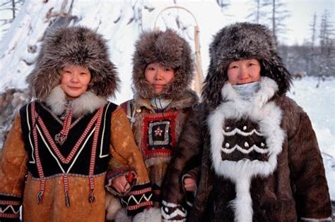 Three Evenk Women Dressed In Traditional Winter Fur Clothing Kusur