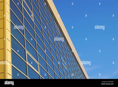 Glass Surface Facade With Windows In A Modern Building Sky Reflecting