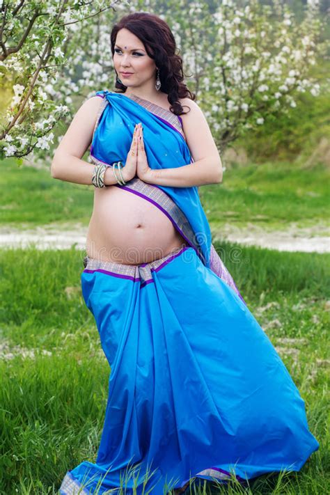 Pregnant Girl Is Wearing Sari Walking In Garden Stock Image Image Of