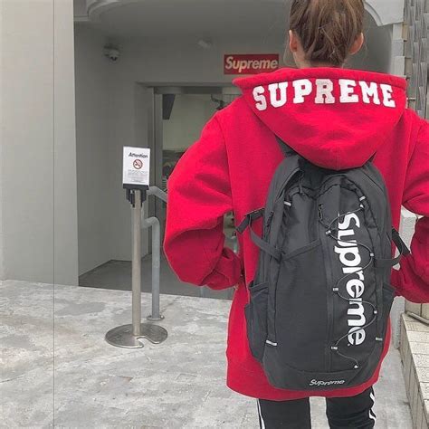 Supreme Hoodie And Backpack Streetwear Fashion Outfit Inspiration For