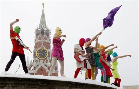 members of the russian radical feminist group ‘pussy riot stage a protest performance in red