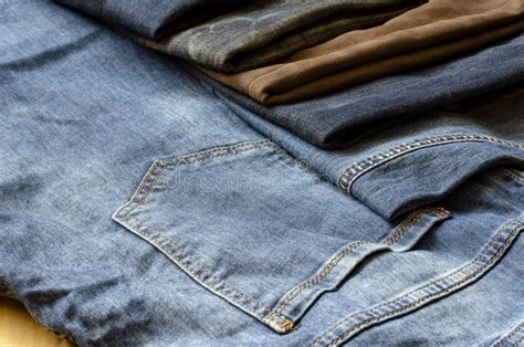 Demonstration Of Various Color Shades Of Denim Trousers Stock Photo