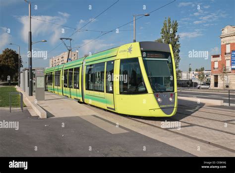 A Bright Yellow City Tram By Citura On Boulevard Joffre In Riems