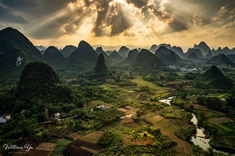 Dramatic Sky Over Karst Hills Of Yangshuo By William Yu Photography On
