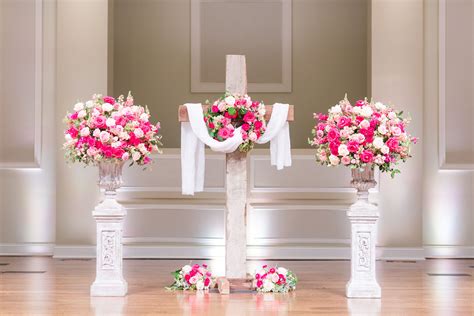 Church Altar Flowers On Large Wooden Cross And Matching White Washed