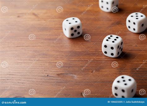 Game Of Chance Concept White Dice On Rustic Wooden Board Stock Image