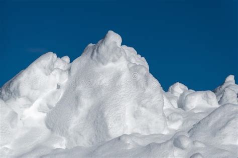 Large Snow Pile Against Dark Blue Sky Stock Photo Image Of Pile