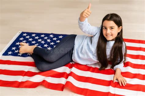 Images Of Lovely Little Girl Over Usa Flag Background Stock Photo