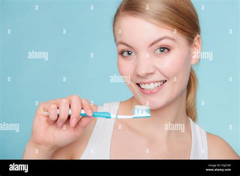Young Woman Brushing Cleaning Teeth Girl Holds Toothbrush With