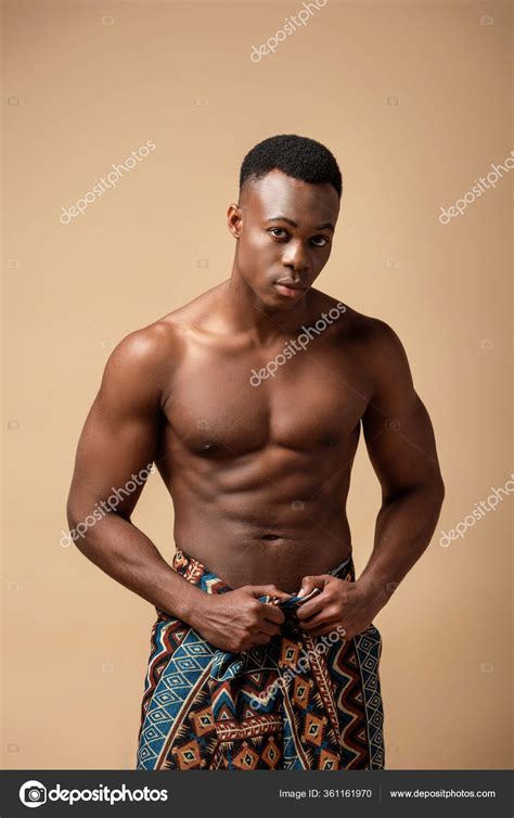 Sexy Naked Tribal Afro Man Covered Blanket Posing Isolated Beige Stock