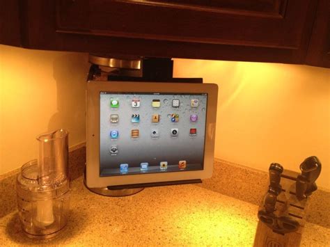 There is no drilling, no wiring, and takes 5 minutes to install. Under Cabinet IPad / Tablet Mount | Tablet mount, Tv in kitchen, Under cabinet