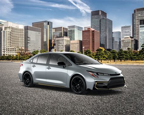 Front Side View Of 2021 Toyota Corolla Apex In Cement Grey In Front Of