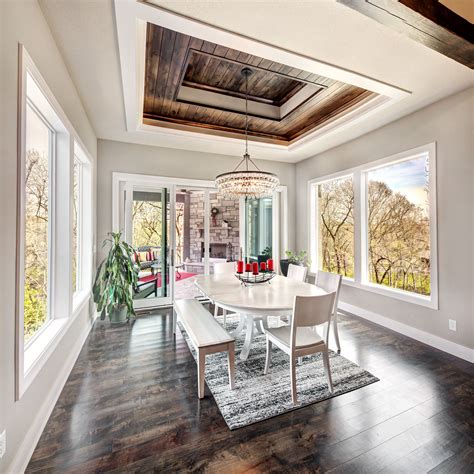 Bright Dining Room With Wood Tray Ceiling And Plenty Of Windows Wood