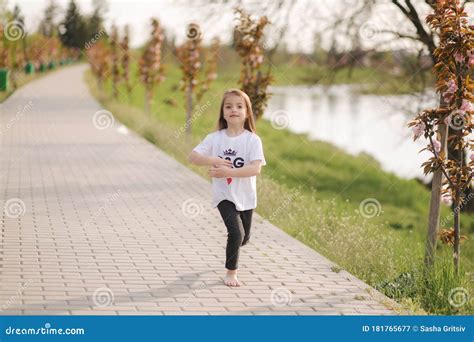 Little Girl Walk In The Park Barefoot Stock Image Image Of Laughing